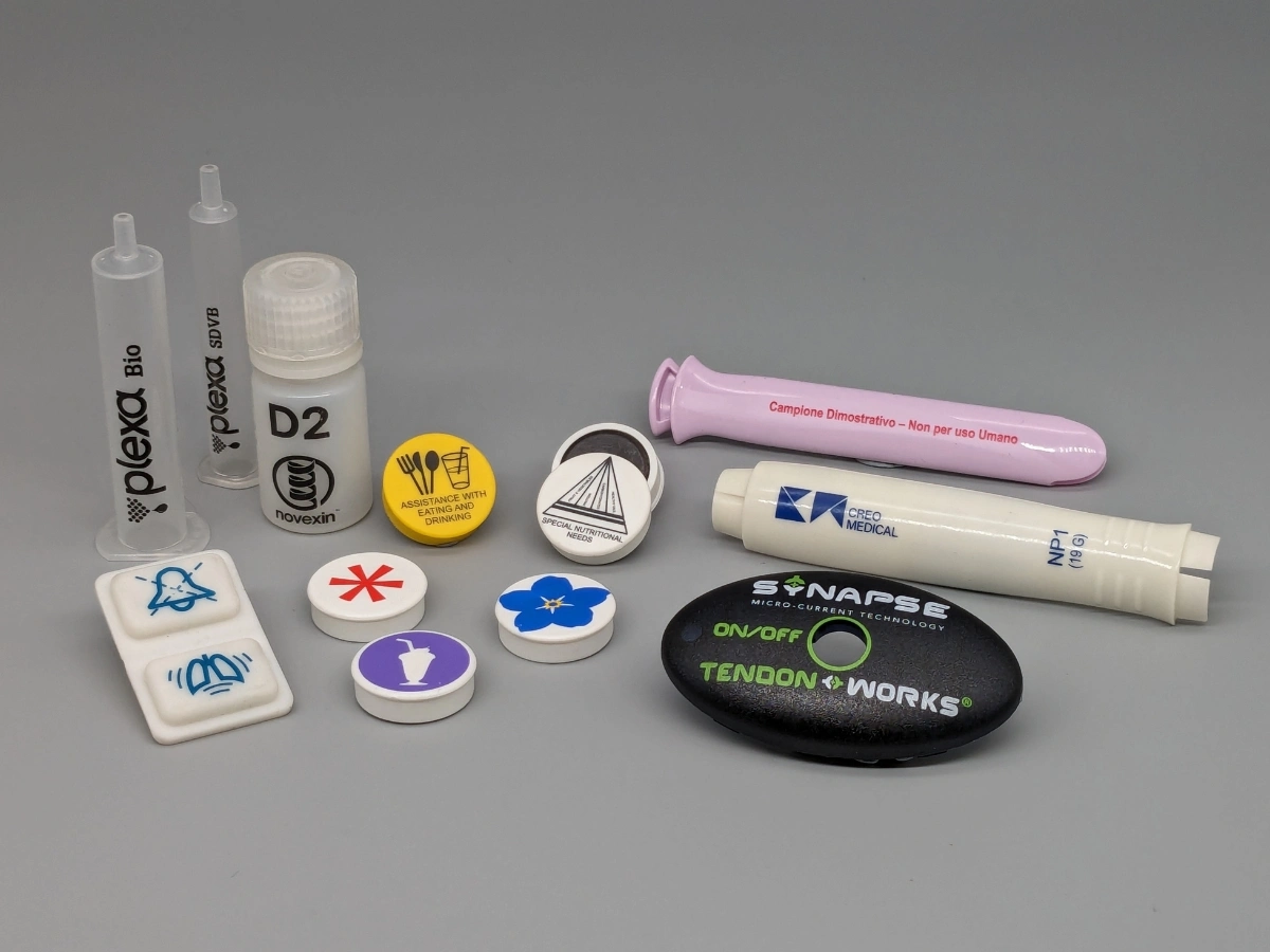 Medical components with pad printed logos and markings